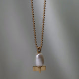 X pearl pendant