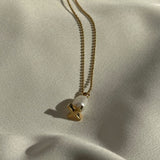 X pearl pendant